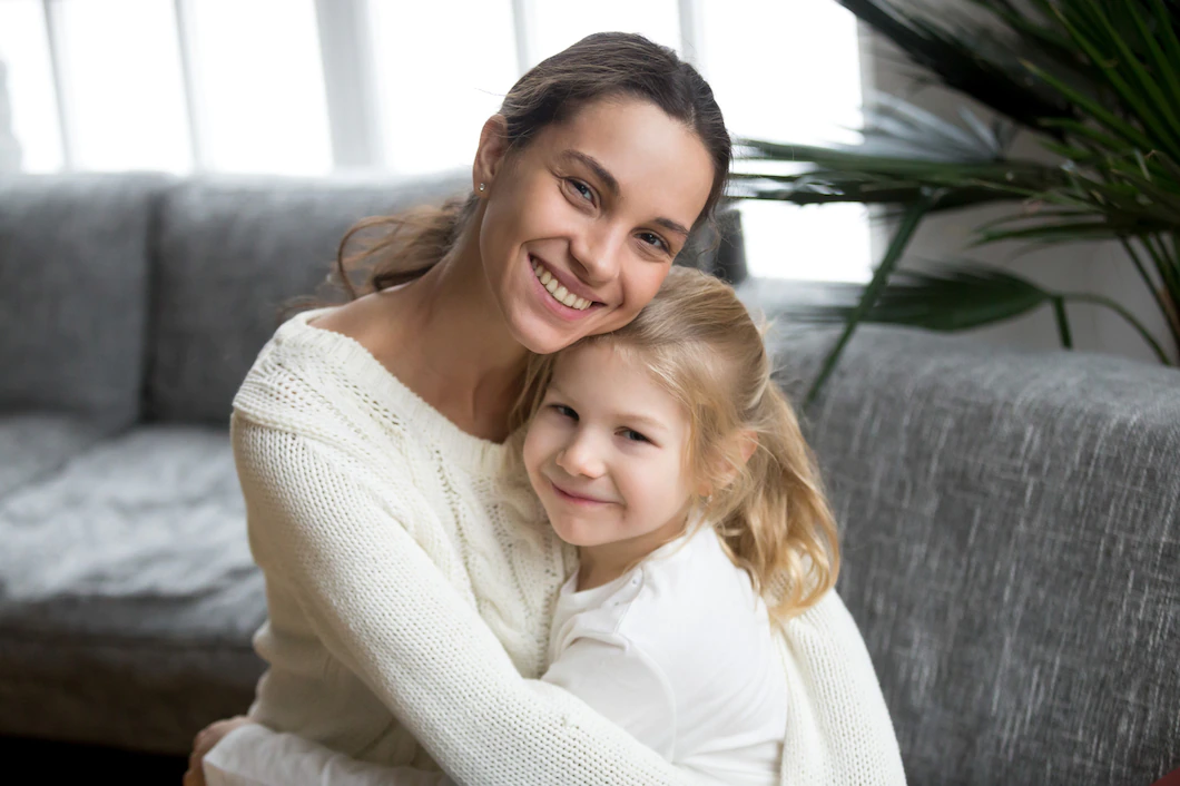 Happy mother and daughter hugging